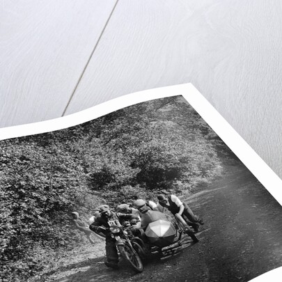 Motorcycle and sidecar competing in the Brighton and Hove Motor Club Brighton-Beer Trial, 1930 by Bill Brunell