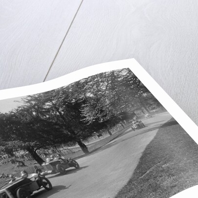 Austin Ulster leading a MG Magnette at Donington Park, Leicestershire, 1930s by Bill Brunell