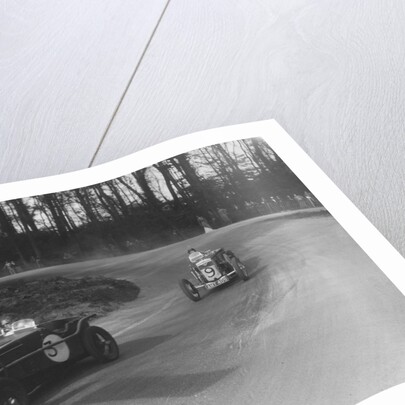 Two Frazer-Nash cars racing at Donington Park, Leicestershire, 1930s by Bill Brunell
