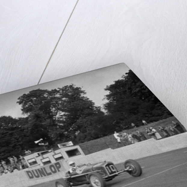 Alfa Romeo of Kenneth Evans taking the chequered flag at Crystal Palace, 1939 by Bill Brunell