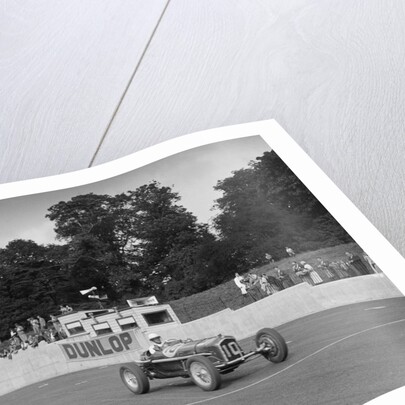 Alfa Romeo of Kenneth Evans taking the chequered flag at Crystal Palace, 1939 by Bill Brunell