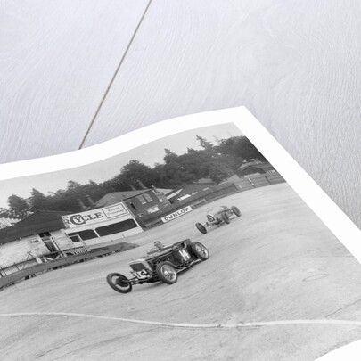 Frazer-Nash of RT Grogan leading Jack Lemon Burton's Bugatti T37, BARC meeting, Brooklands, 1933 by Bill Brunell