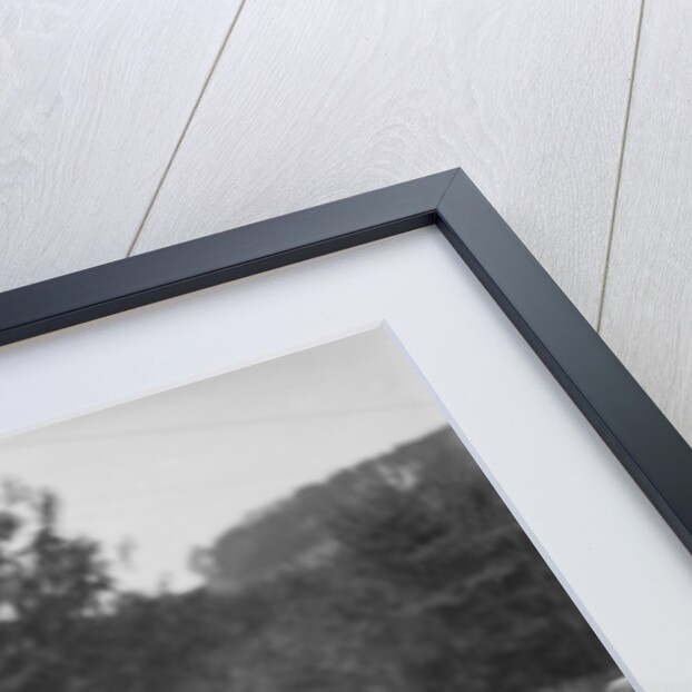 Dachshund sitting on the bonnet of Charles Mortimer's Bentley, c1930s by Bill Brunell