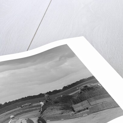 Two MGs racing at Brooklands, Surrey, c1930s by Bill Brunell