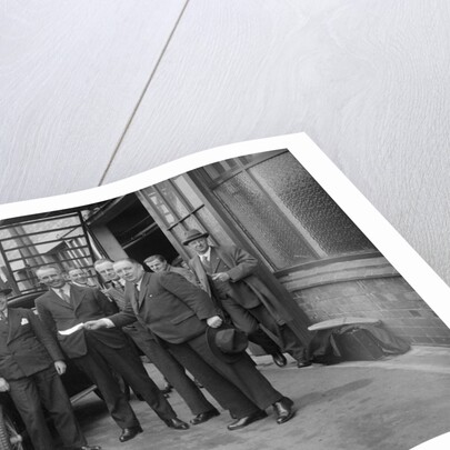 Group of men with a Triumph Super Seven, c1930(?) by Bill Brunell