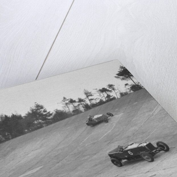 Bentley of Major H Butler and Sunbeam of BO Davis racing at a BARC meeting, Brooklands, 1930 by Bill Brunell
