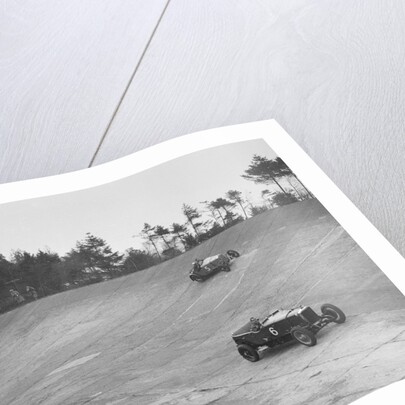 Bentley of Major H Butler and Sunbeam of BO Davis racing at a BARC meeting, Brooklands, 1930 by Bill Brunell