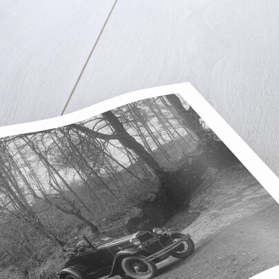 Kitty Brunell driving a 1930 2-seater Ford Model A, 1931. by Bill Brunell