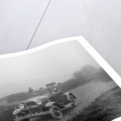 Kitty Brunell driving a 1930 2-seater Ford Model A, 1931. by Bill Brunell