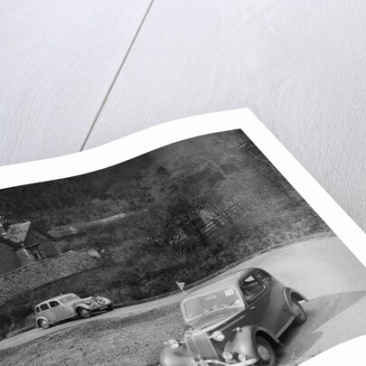 Vauxhall 10 of Miss IM Burton amd Rover of CG Dunham competing in the RAC Rally, 1939 by Bill Brunell