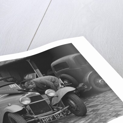 AES Curtis looking under the bonnet of his HRG at the RAC Rally, 1939 by Bill Brunell