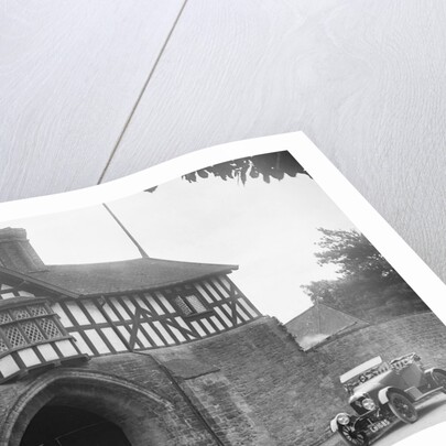 Singer 10 hp open 2-seater by the gatehouse of Stokesay Castle, Shropshire, 1920s by Bill Brunell