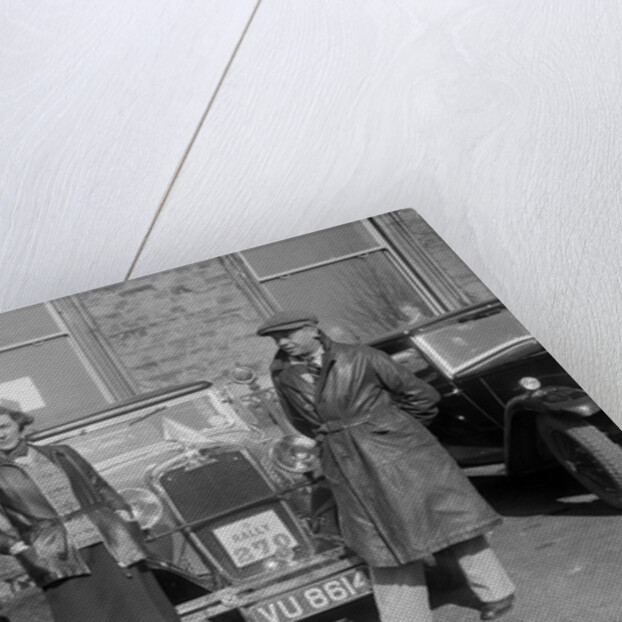 SA Crabtree and Kitty Brunell beside their Crossley cars at the RAC Rally, 1932 by Bill Brunell