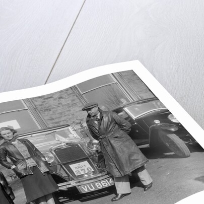 SA Crabtree and Kitty Brunell beside their Crossley cars at the RAC Rally, 1932 by Bill Brunell