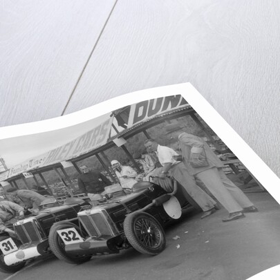 Three MG C type Midgets in the pits at the RAC TT Race, Ards Circuit, Belfast, 1932 by Bill Brunell