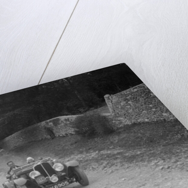 Triumph open tourer competing in a motoring trial, Nailsworth Ladder, Gloucestershire, 1930s. by Bill Brunell