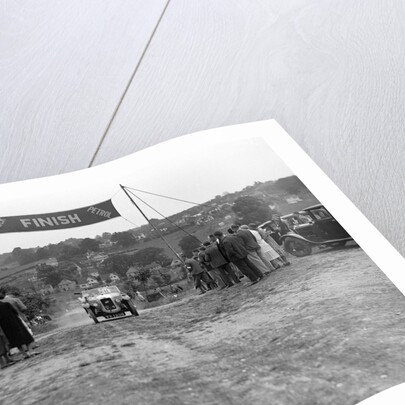 Austin Swallow of Mrs A Stanley at the finish of the Middlesex County AC Hill Climb, c1930 by Bill Brunell