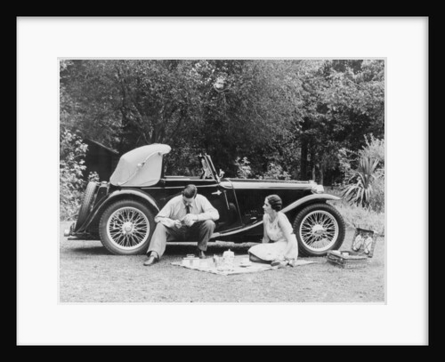 Couple having a picnic by an MG TA Midget, late 1930s by Unknown