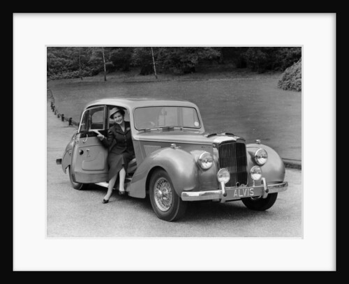 Woman in a 1954 Alvis 3 litre TC 21, (late 1950s?) by Unknown