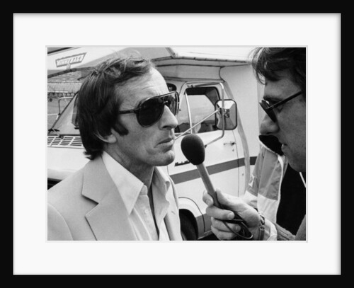 Jackie Stewart being interviewed, 1980 by Unknown