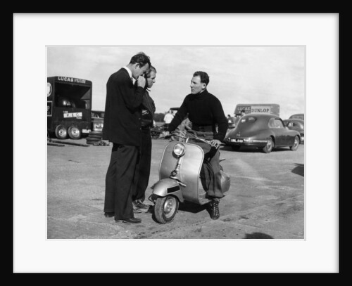Stirling Moss on a Vespa scooter, Goodwood, April 1952 by Unknown