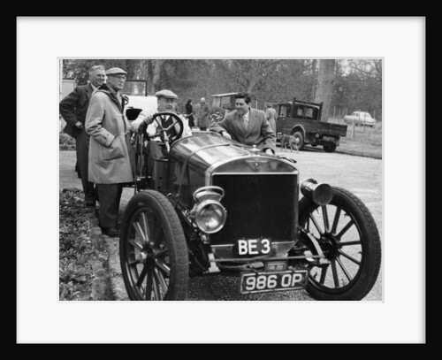 Lord Brabazon in the driver's seat of a vintage car, 1956 by Unknown