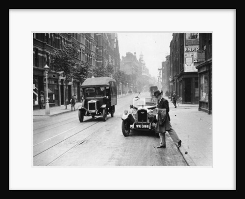 A Rover 1928 10/25 HP sports car parked in a London street, 1931 by Unknown