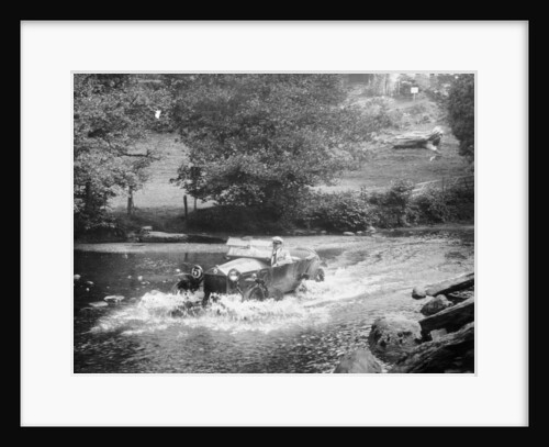 A Lancia Lambda being driven through water by Anonymous