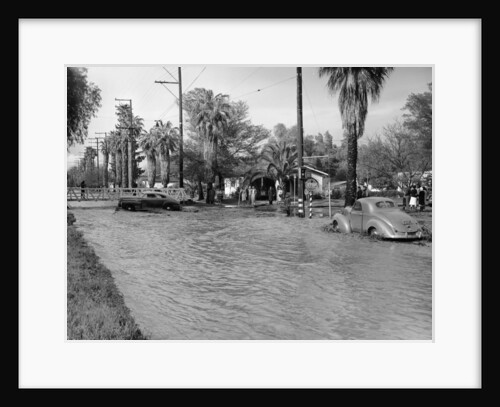 A Pontiac and a Willy's in a flood, USA, c1941 by Unknown