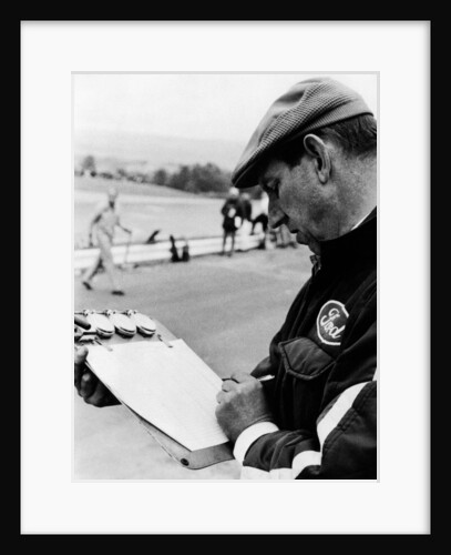 Ken Tyrrell noting down times by Anonymous