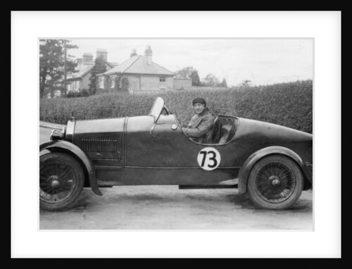 Amy Way seated in a racing car by Unknown