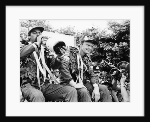 Hans Thorszelius drinking champagne and Bjorn Waldegaard, winners of the Acropolis Rally by Anonymous