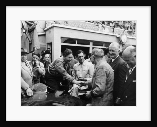 Peter Whitehead being congratulated on his victory with Peter Walker of the Le Mans 24 hours, 1951 by Unknown