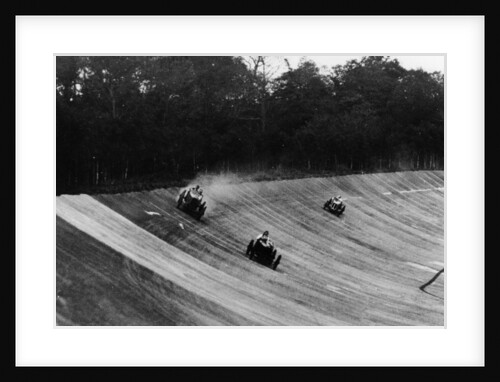 Louis Zborowski passing Humphrey Cook's Ballot by skidding above him, Brooklands by Unknown