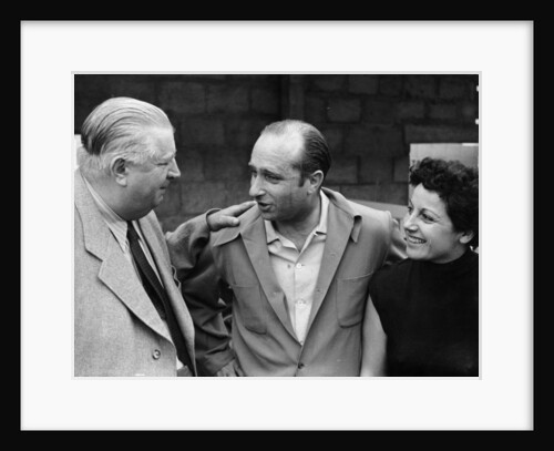 Alfred Neubauer with Juan Manuel Fangio and his wife by Anonymous
