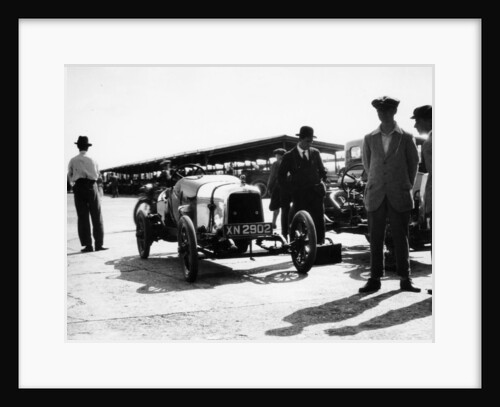 Malcolm Campbell and a Talbot car in the Paddock at Brooklands, Surrey, June 1923 by Unknown