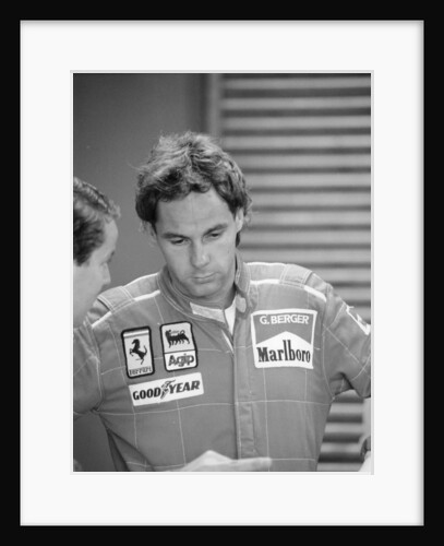 Gehard Berger listening to a member of the Ferrari team, 1988 by Unknown