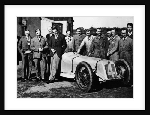 Robert Benoist with a cigarette, leaning against a Delage 15-S8, 1927 by Unknown