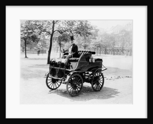 Roger Wallace in his electric car, 1899 by Unknown