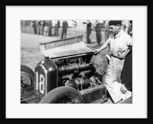 Attilio Marinoni, chief mechanic of Scuderia Ferrari, with an Alfa Romeo, 1934 by Unknown