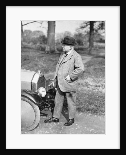 Victor Holroyd with a Triumph car by Unknown