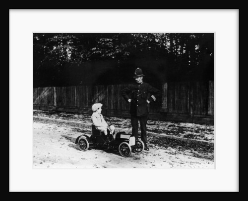 Boy in 1908 Mercedes pedal car by Unknown