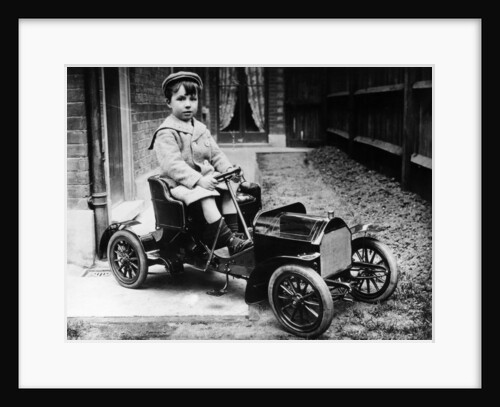 Boy in 1908 Mercedes 28/32 hp pedal car, c1908 by Unknown