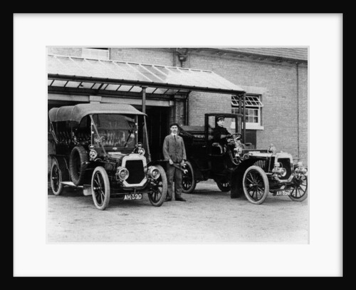 Chauffeurs with their convertible cars by Unknown