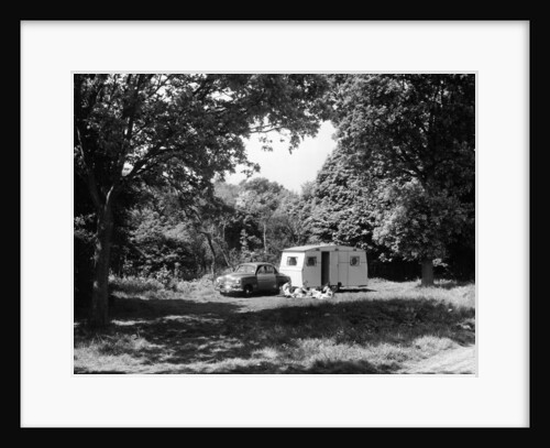 A family relaxing on holiday with their 1951 Vauxhall Wyvern and caravan, (1951?) by Unknown