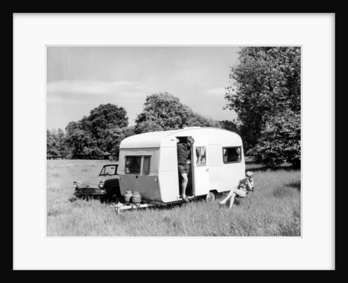 Couple on holiday with their 1963 Sprite Alpine caravan, (c1963?) by Unknown