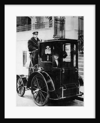 Woman passenger in a 1910 taxi cab, New York, USA, (c1910?) by Unknown