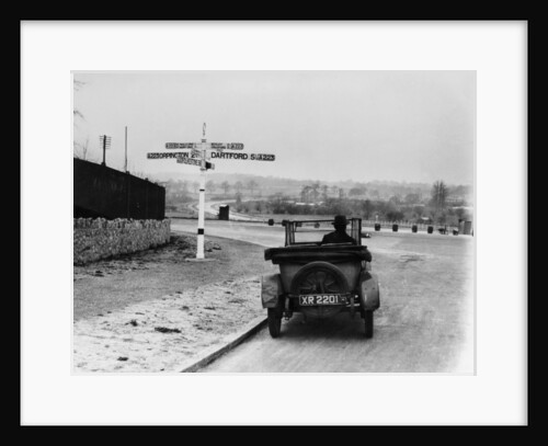 Car near a road sign, Bromley, Kent, 1920s by Unknown
