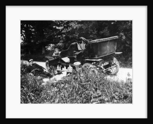 Two men picnicking beside a Vauxhall car, c1906 by Unknown