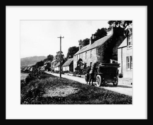 A man by his car in a village lane, 1900 by Unknown